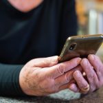 Photo of person looking at phone